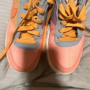 Nike Colorful Sneakers with Pink and Yellow Accents